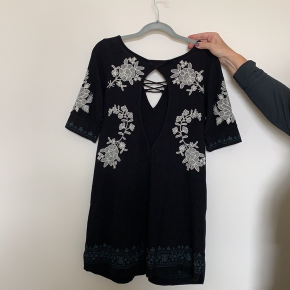 Free people black knit top with key hole and white embroidery. - Picture 2 of 2
